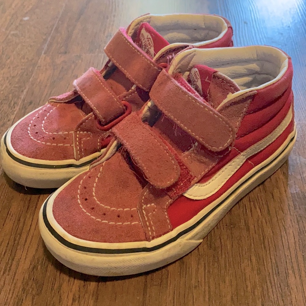 Red Vans high tops